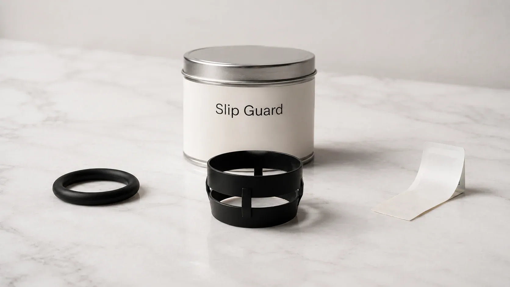 Slip Guard ring, cock rings, and condom tape compared for preventing condom slippage